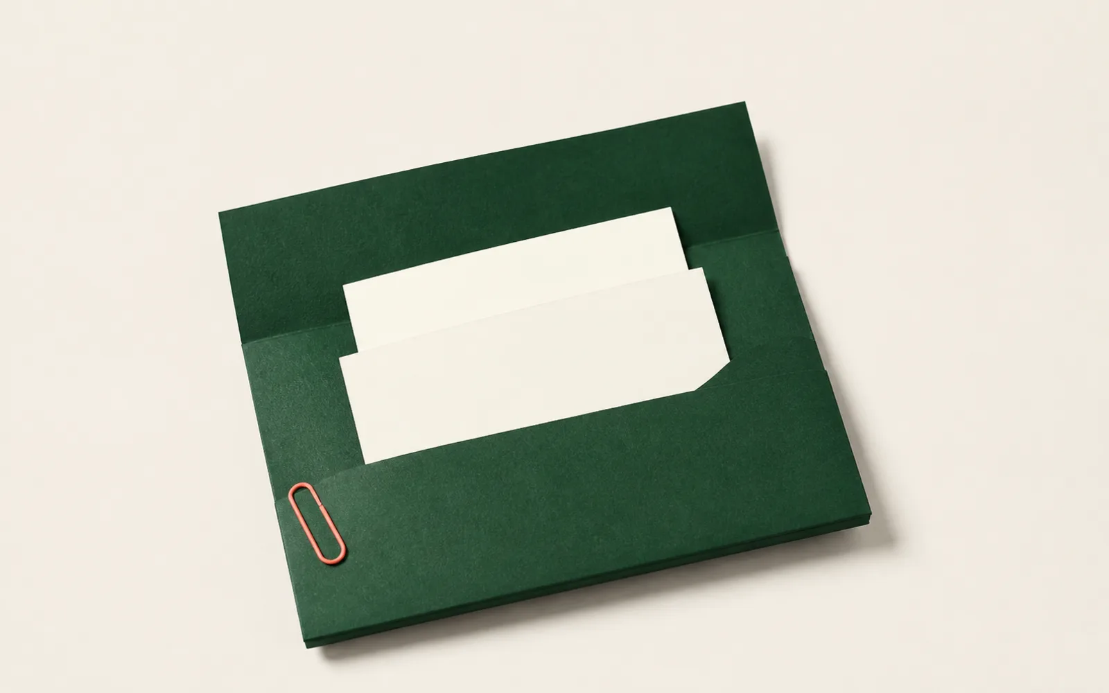 A green folder with blank partner cards